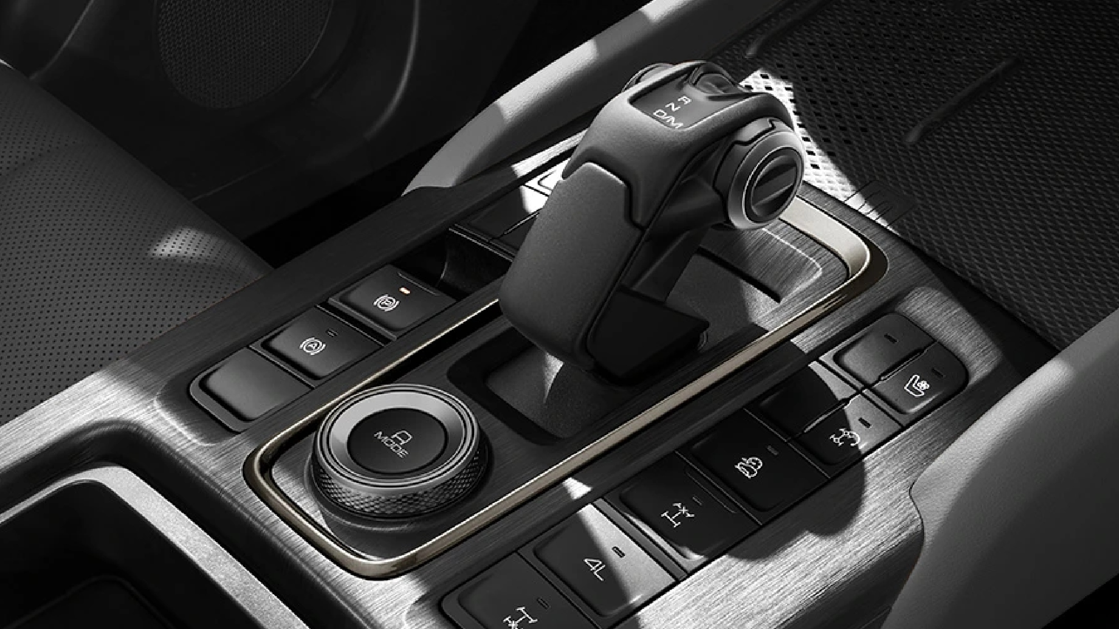 Vista cercana de caja de cambios automática de GWM New H9 con interior de lujo. 